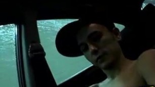 Cute amateur twink wanks his hard prick in the moving car
