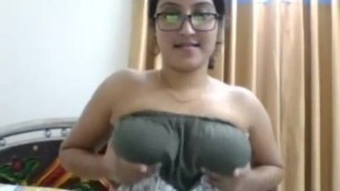 Julie Bhabhi playing with her tits