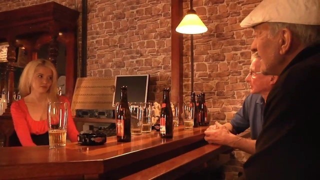 Two tourist oldmen fuck american blonde in a bar